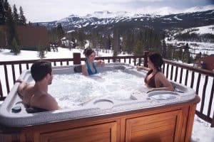 Friends chatting in a hot tub