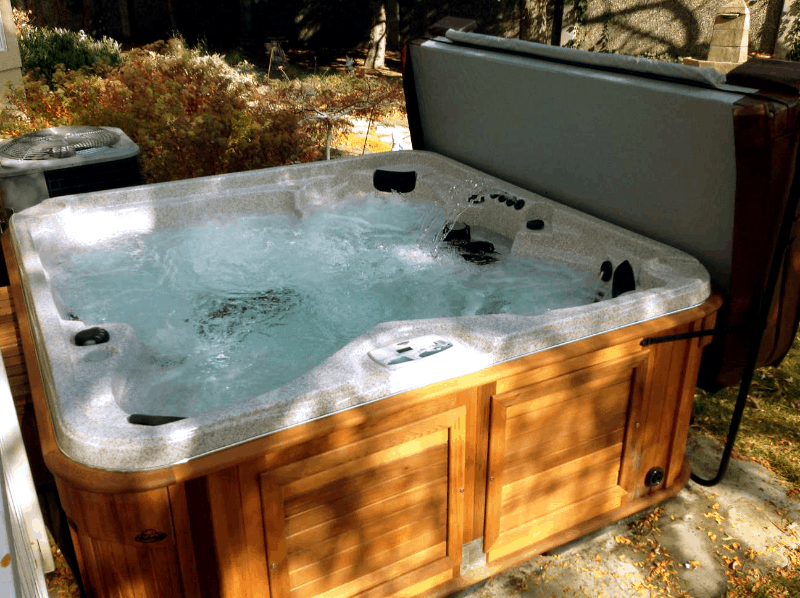 Arctic Spas Hot tub with an open cover